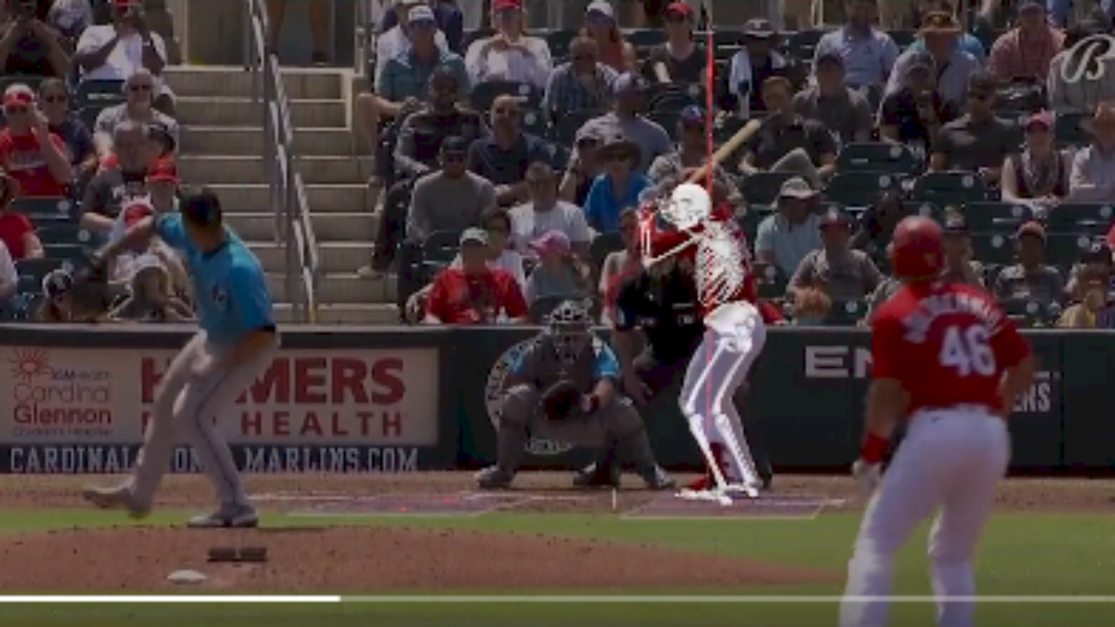 Baseball players in a stadium, with the batter's skeleton overlaid